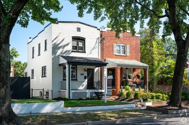 Updated semi-detached brick row homes line the streets of Benning Heights.