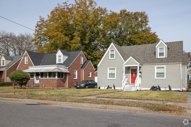 Cape Cod home with tidy lawns Line the streets of Coronado.