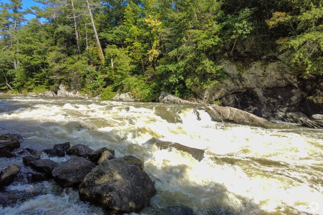 Rushing waterfalls can be seen through the Presumpscot River Preserve in North Deering.
