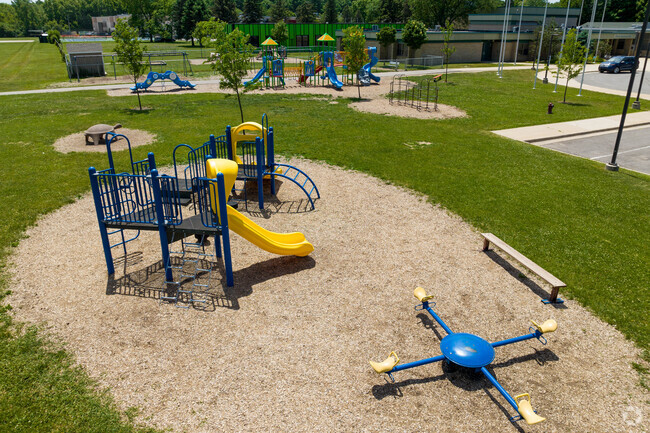 Young children love the Mitchell Elementary School playground during recess and after school.