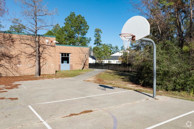 Students can play a game of basketball during recess.