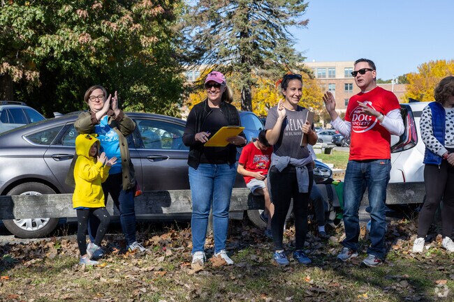 The judges are very thorough at the Annual Dog Halloween Costume Contest.