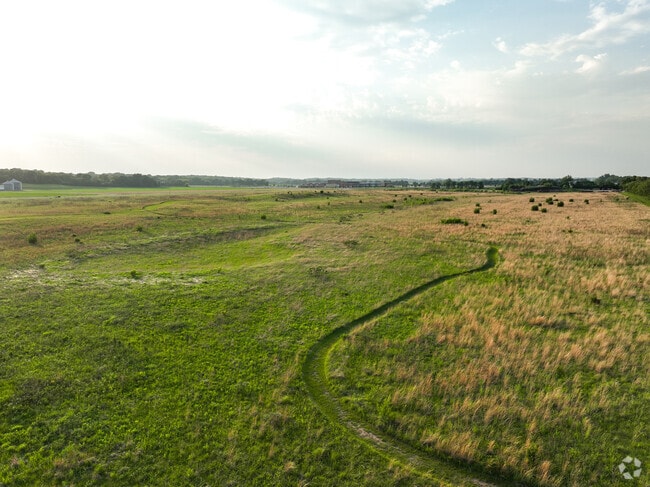 Rolling hills of prairie grass can be found on the west end of Saint Peter