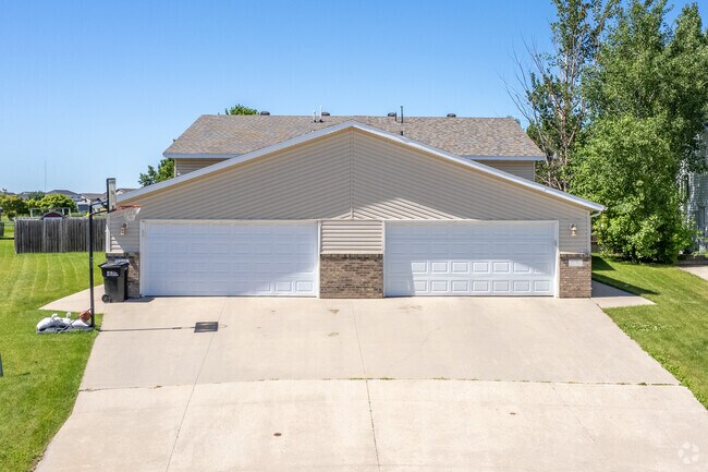 Elmwood Court features charming twin homes that offer modern living in a cozy community.