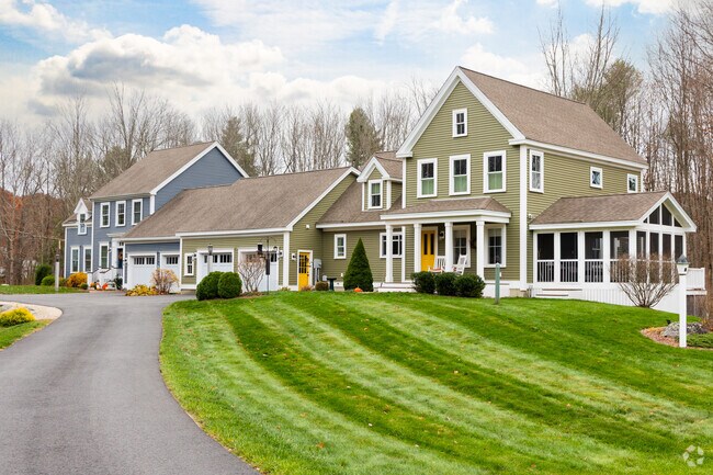 Sprawling new builds line secluded subdivisions near the water in Newington.