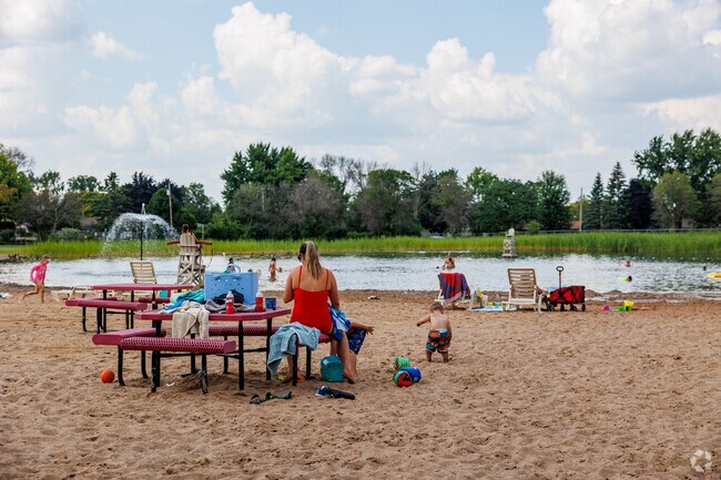 Sunset Park includes a beach swimming area for visitors to cool off on a hot day.