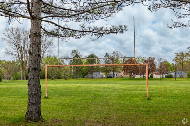 A football field at Rollingwood Park is home to both friendly pickup games and school sports.
