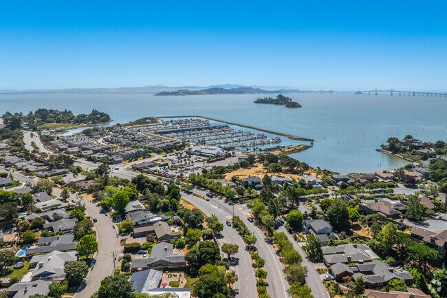 San Pedro Road runs along the harbor, connecting Country Club to the surrounding area.