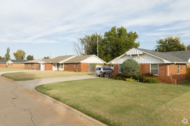 Ranch-style homes with large front yards are a common sight  in The Village.