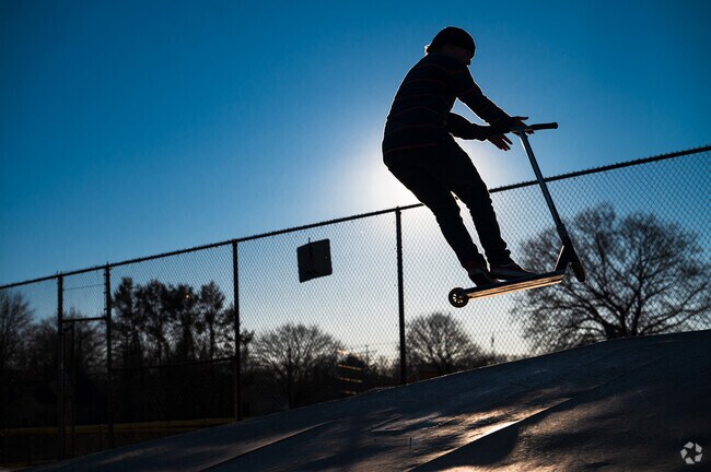 Skaters and scooter riders express their creativity at Uxbridge Skate Park.