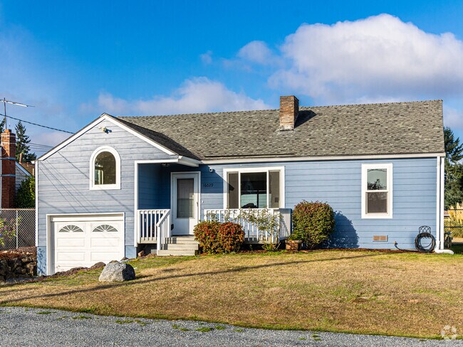 Homes in Lake Burien sit on well-maintained yards and attached garages.