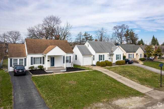 Quaint older style single family homes typically have smaller yards in the Tri-Village area.