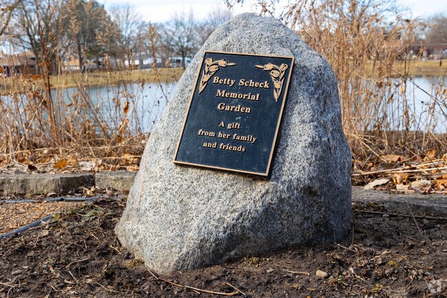 Commons Park dedication stone.