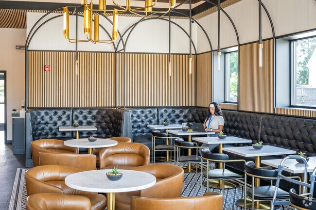 Relax and enjoy a warm cup of coffee at Society Coffee Bar in Somerset Historic Village, MA.