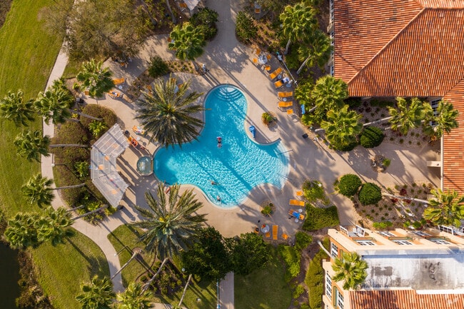 Relax poolside on a nice day at the Downtown Village pool in Central Florida's Solivita town.
