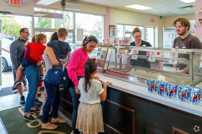 Children and parents delight in Kelly's Ice Cream's delicious homemade treats in Audubon Park.