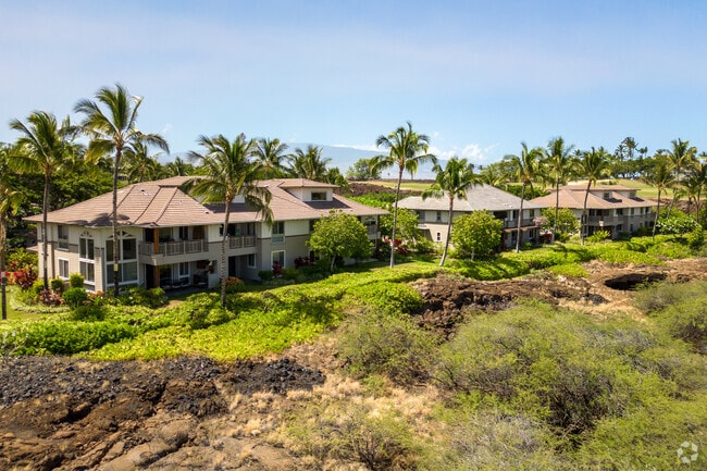 Homes are built on extinct lava flows near the ocean.