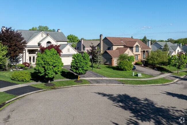 Large homes with tidy lawns line the streets of West Bloomfield.