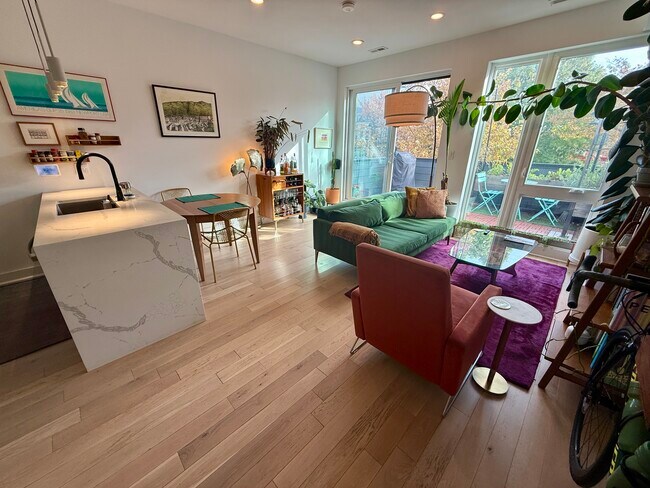 Living room and main spaces have 9' ceilings and floor-to-ceiling windows