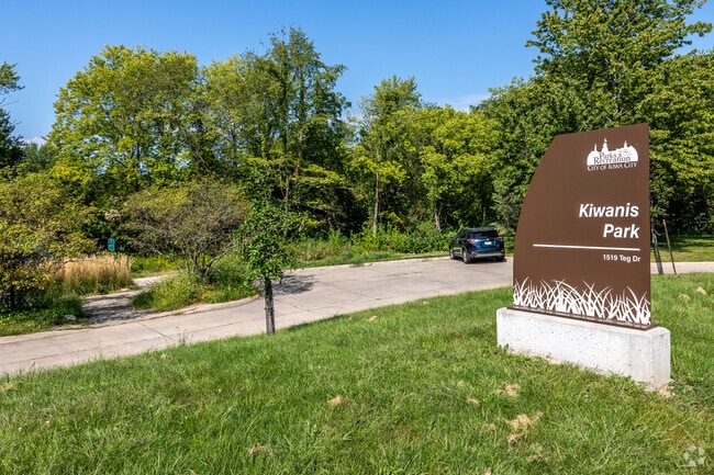 Kiwanis Park blends into the east side of Ty N Cae and has trails, green space, and a playground