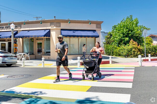 The Adams Hill shopping district features a pedestrian-friendly crossing at intersections.