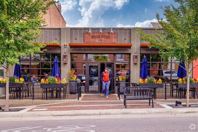 A patron exits East End Grill, a popular restaurant in downtown Lafayette near Perrin.