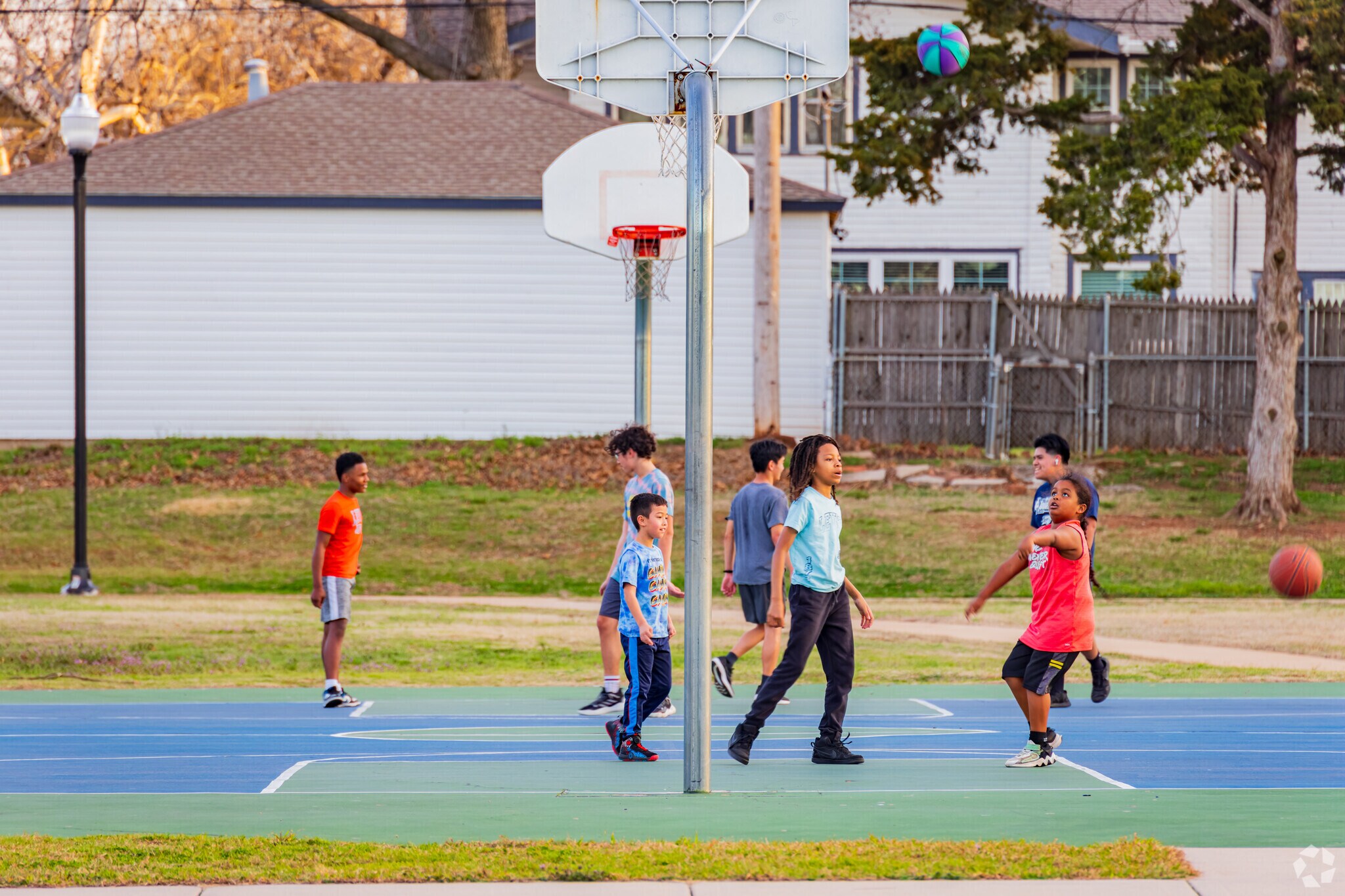 Children love playing basketball in Memorial Park near Epworth.