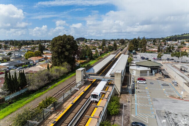 A BART train departs the station, connecting Glen Eden residents to greater Bay Area.