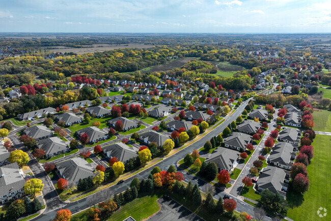 Rows and rows of townhomes adorned with fall color in Farmington.