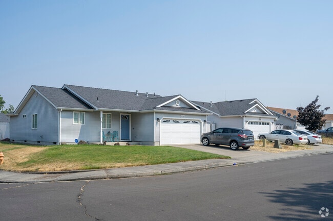 Affordable, single-level homes in White City appeal to families and first-time buyers seeking space and simplicity.