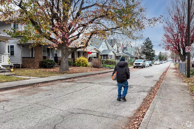 Some residents of Hawthorne prefer to walk down the quiet streets rather than use the sidewalk.