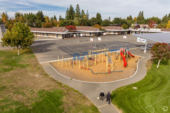 Students at Amy Imai Elementary School enjoy playing on the sports courts and play structures.