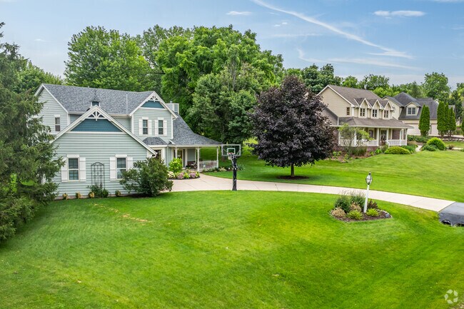 Newly constructed homes with established trees are found in Delafield Town.