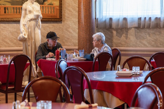 Enjoying an early lunch at Santino's Italian Cuisine minutes from the Limestone neighborhood.