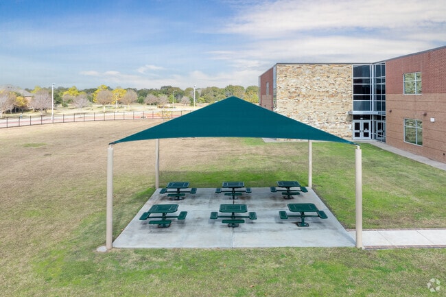 Enjoy the fresh air in Pope Elementary School's outdoor seating area.