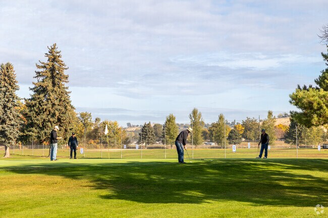 Golfers gather at Suntides Golf Course near Gleed.