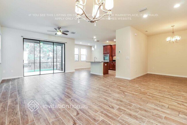 4954 Wandering Way, Wesley Chapel, FL 33544 - photo 3