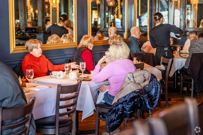 Enjoy fine food and drinks at The Brass Rail in Locust Valley.