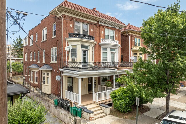 A terracotta roof facade and bowed windows make this Downtown Lancaster home distinctive.