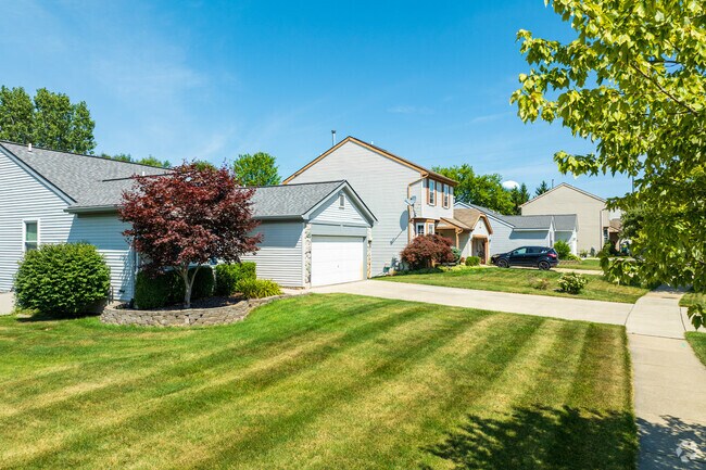 Hartland’s tree-lined sidewalks wind through quiet residential streets with classic homes.