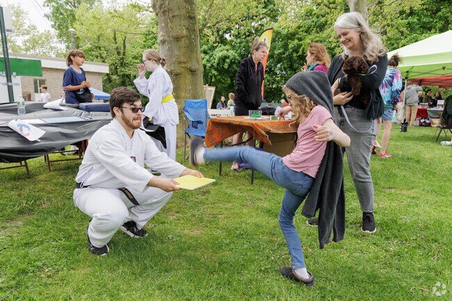 Showing off a karate kick at Leonia Day in Leonia.