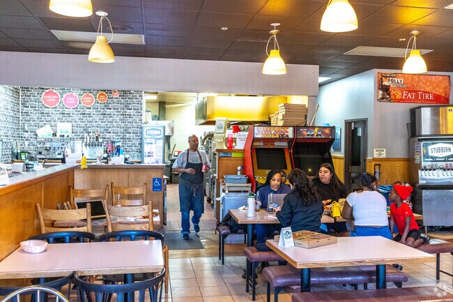 The owner at Skyline Pizza always greets you with a smile and great food in Sequoyah.