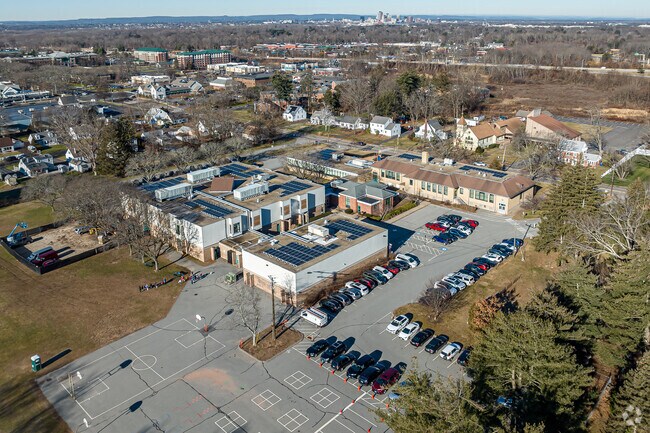 Naubuc School has a teacher to student ratio of 12:1.