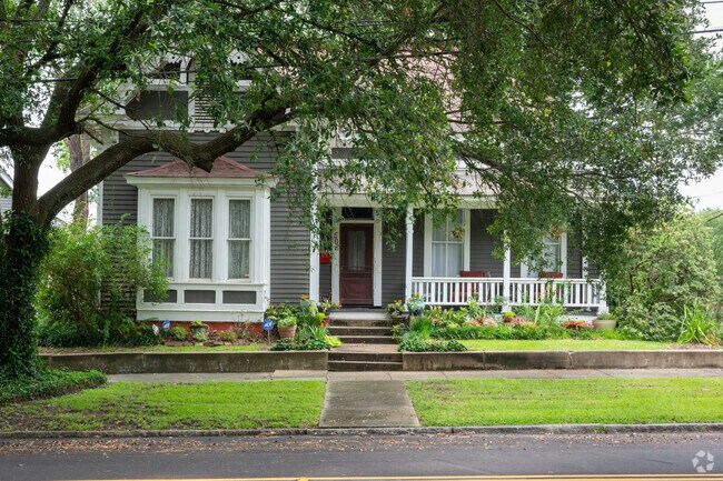 Enjoy sitting on your front porch in the shade in the Cottage Hills neighborhood.