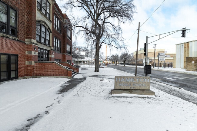 There is a stone sone for Hamilton Middle School near the main road.