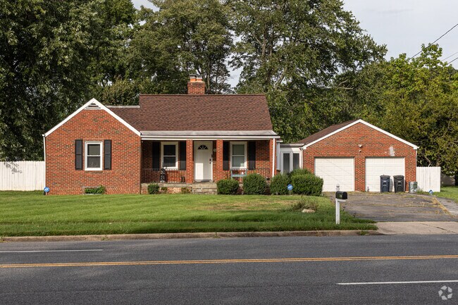 Many of the homes in Marlow Heights have brick facades and grassy lawns.