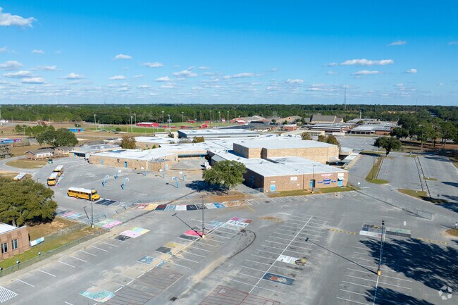 Engaging young minds in creative expression through art classes at Pine Forest High School.