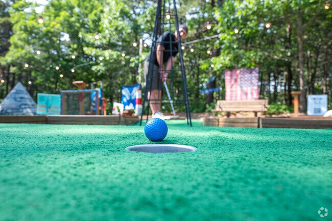 Monomoscoy Island try and get a hole-in-one at Mashpee Mini Golf.