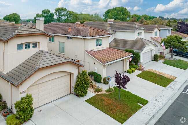Spanish-influenced homes sit side-by-side in River Road.