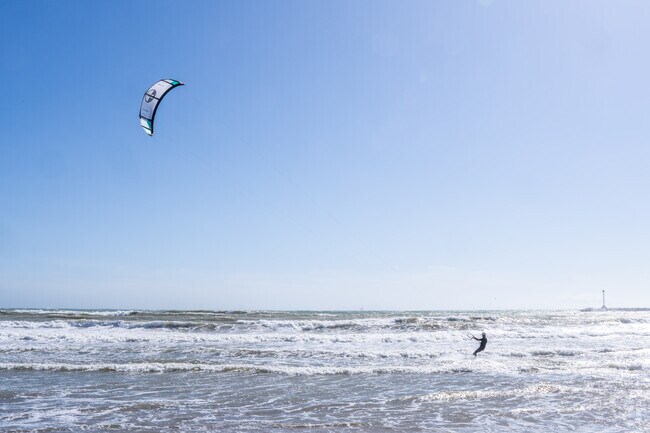 There are many kite surfers along the nearby Oxnard Coast.